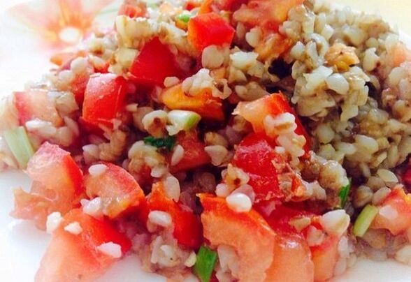 Buckwheat porridge with tomatoes, carrots and onions on the diet menu